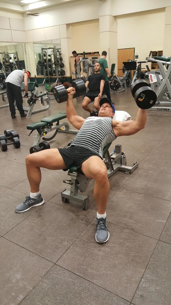 John E. Lewis, Ph.D. weight training in a gym